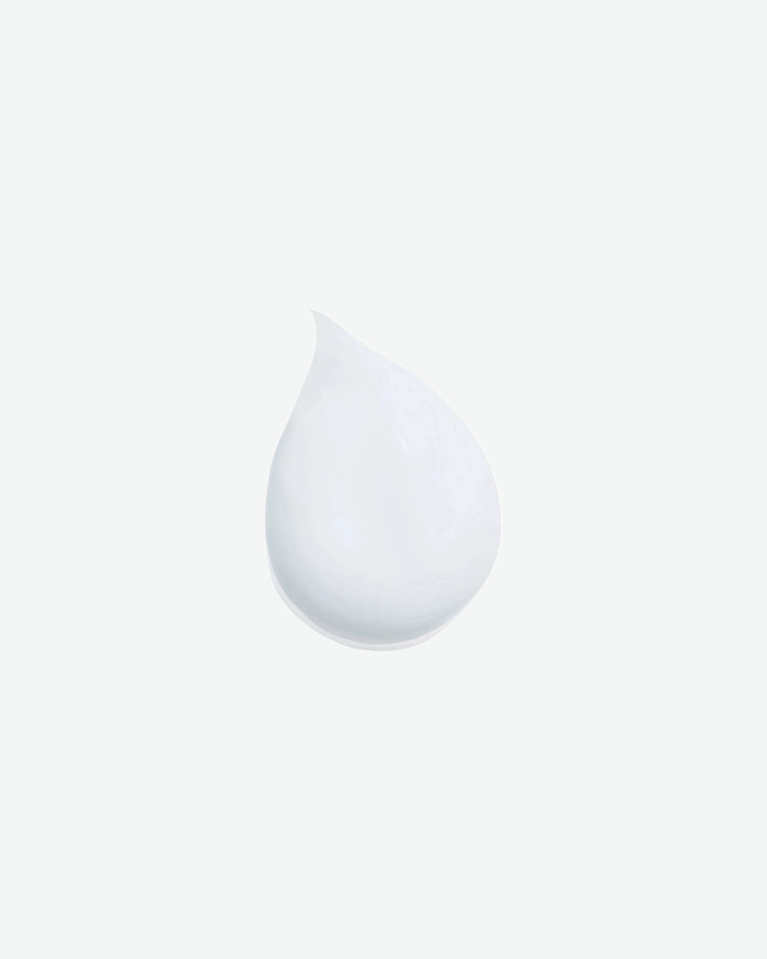 White teardrop-shaped object on a light gray background