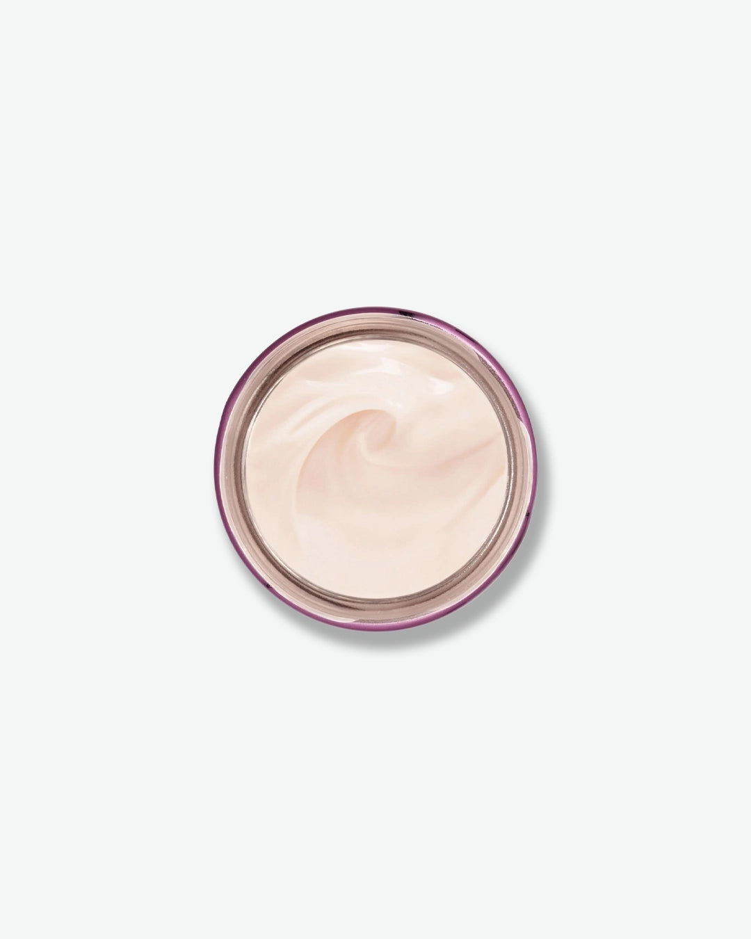 Cosmetic cream in a round container on a light gray background