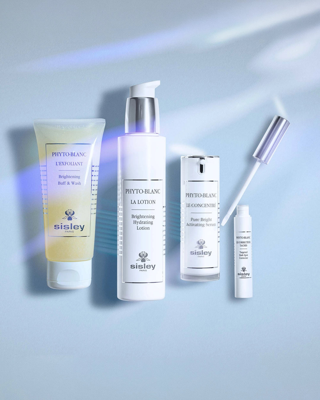 Sisley skincare products on a light blue background