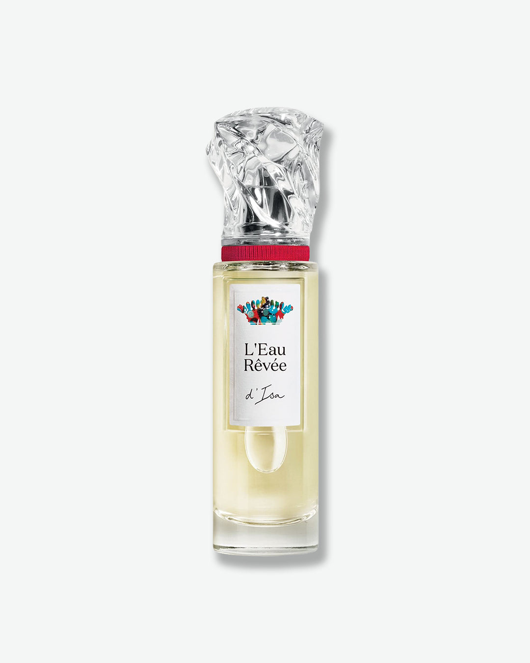 Perfume bottle labeled 'L'Eau Revée' with a decorative cap on a white background
