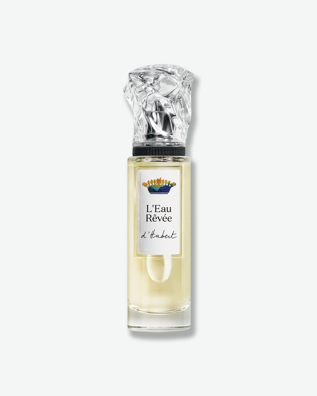 Perfume bottle labeled 'L'Eau Revee' on a white background