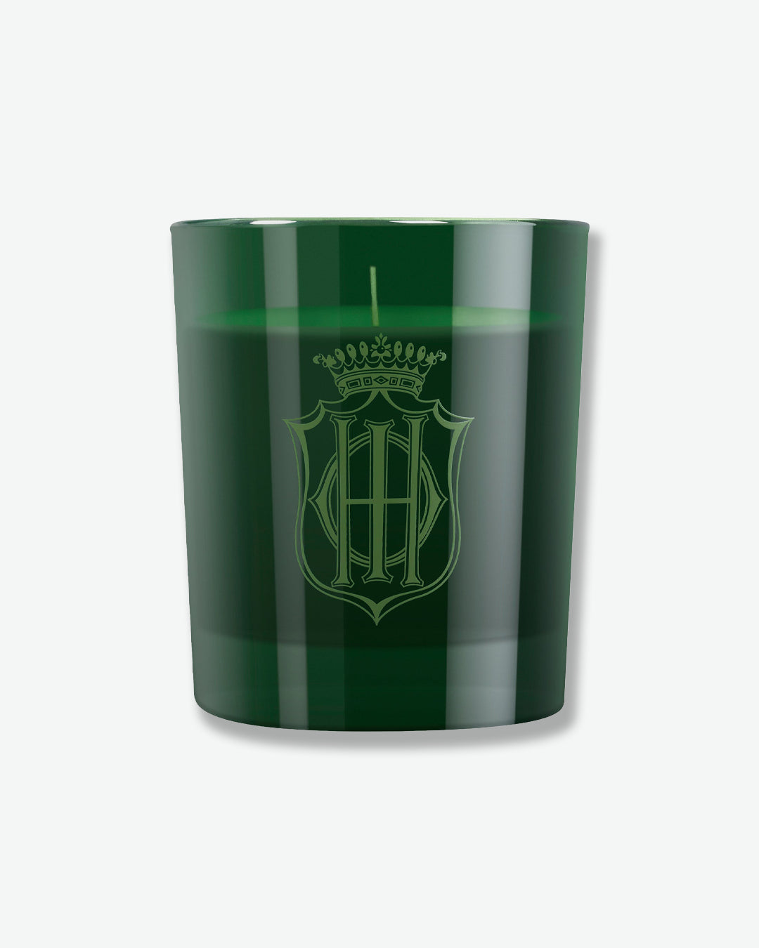 Green candle with a logo on a white background