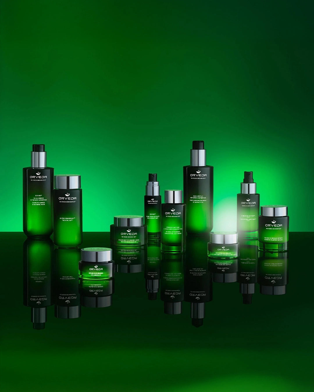 Collection of green skincare products on a green background