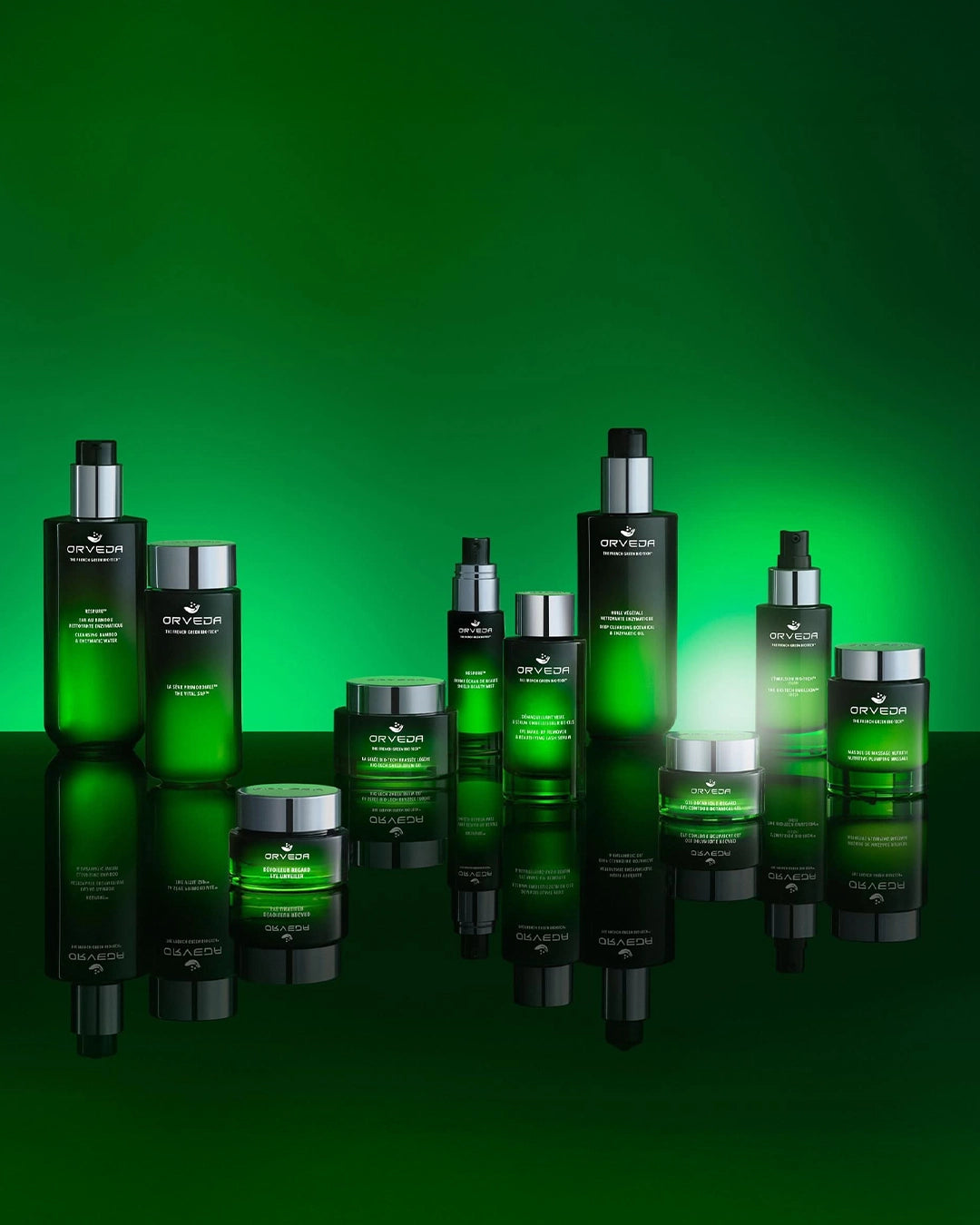 Collection of green skincare products on a green background