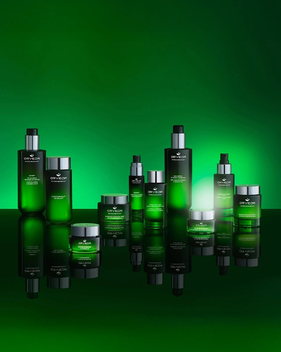 Collection of green skincare products on a green background