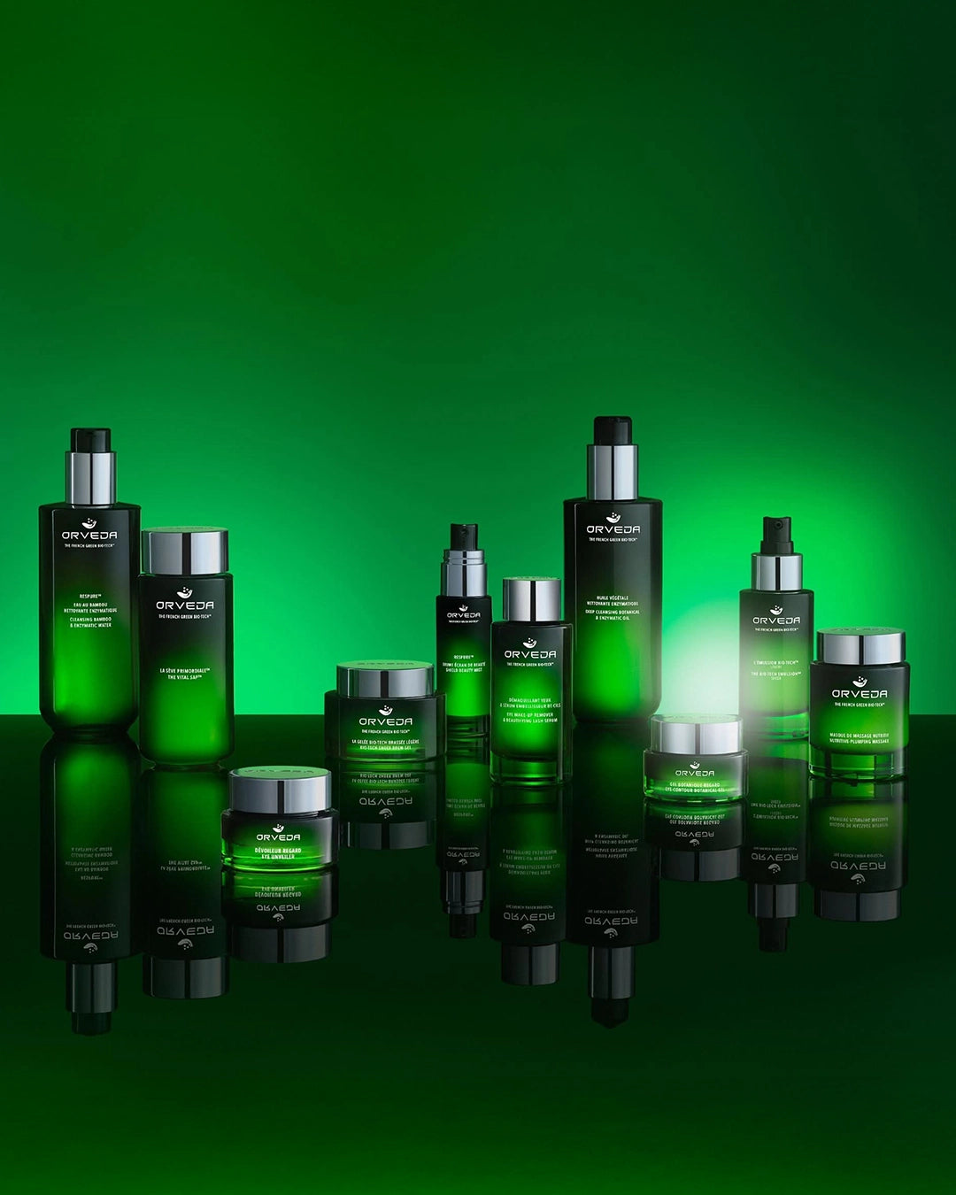 Collection of green skincare products on a green background