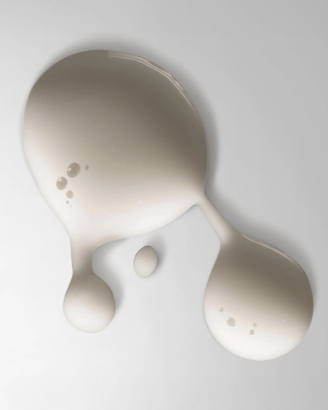 White cream on a light gray background