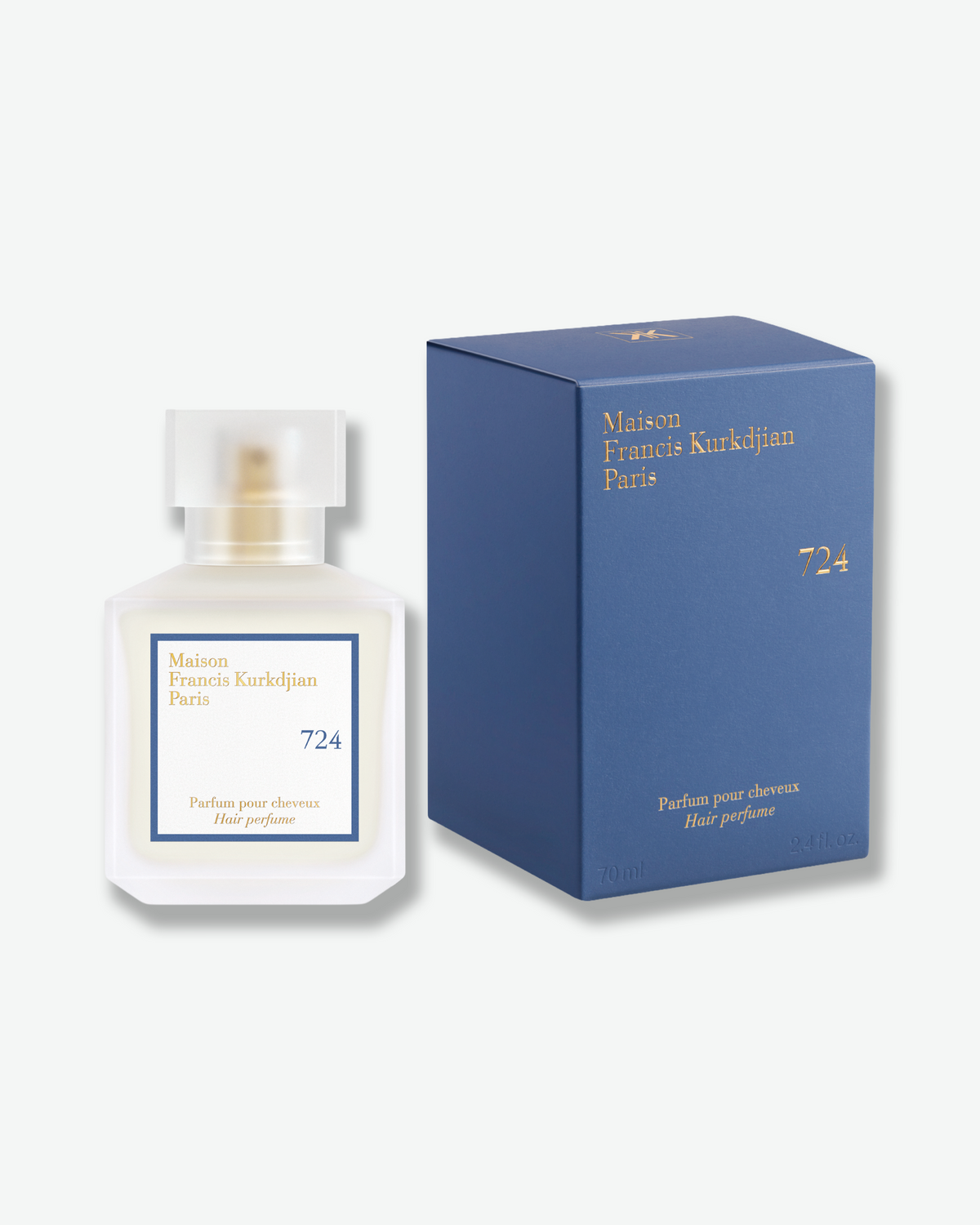 Maison Francis Kurkdjian 724 Hair Perfume bottle displayed beside its blue presentation box.