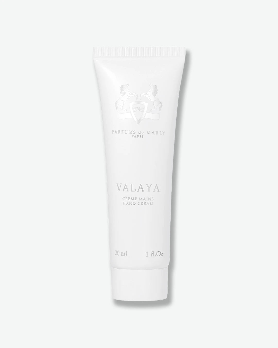 A white squeeze tube of Valaya Hand Cream by Parfums de Marly Paris, centered on a clean white background.