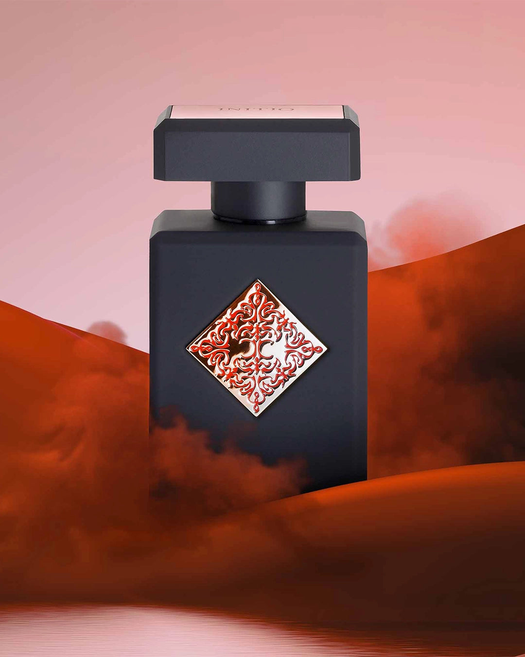 Black perfume bottle with a decorative label on a gradient background