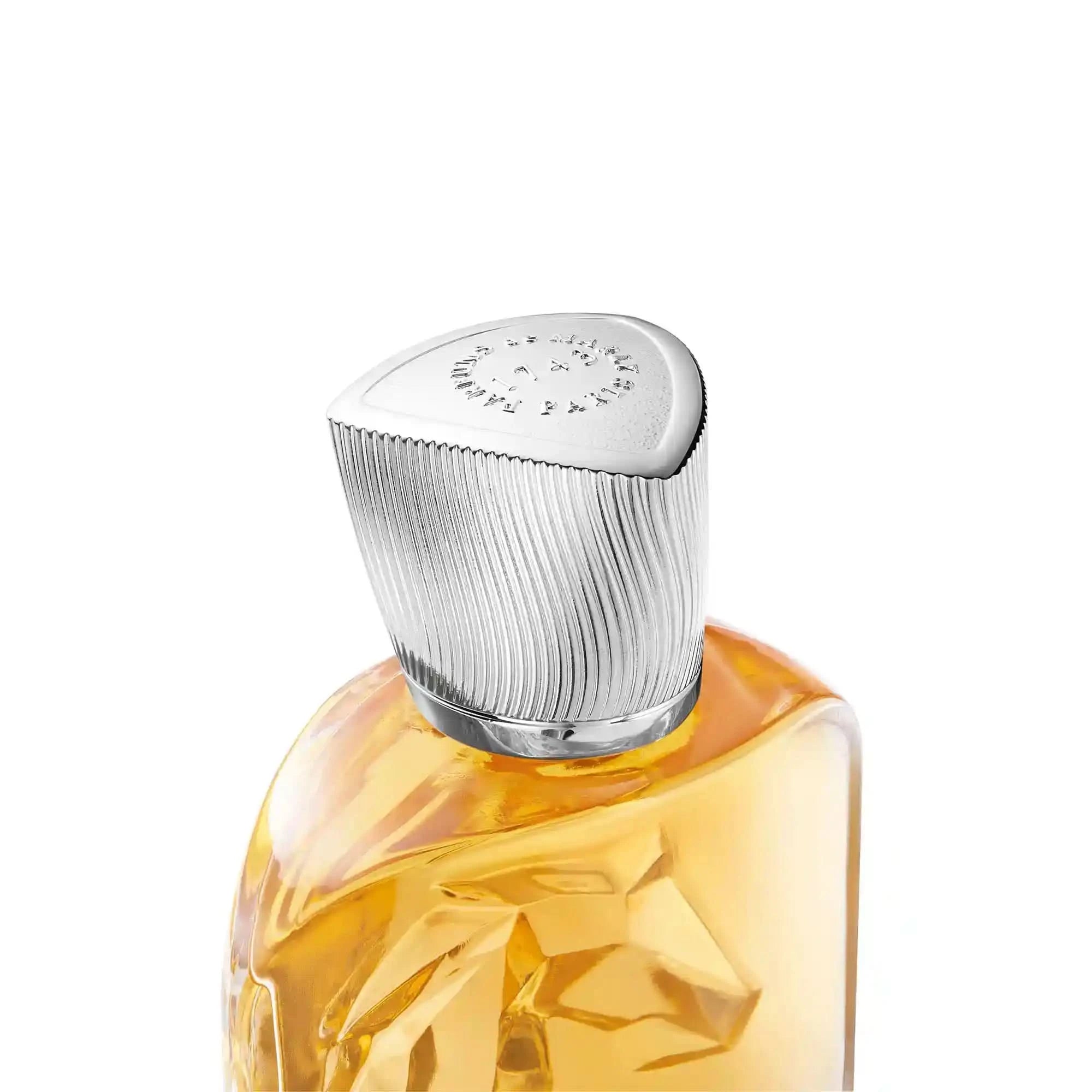Perfume bottle with silver cap on a white background