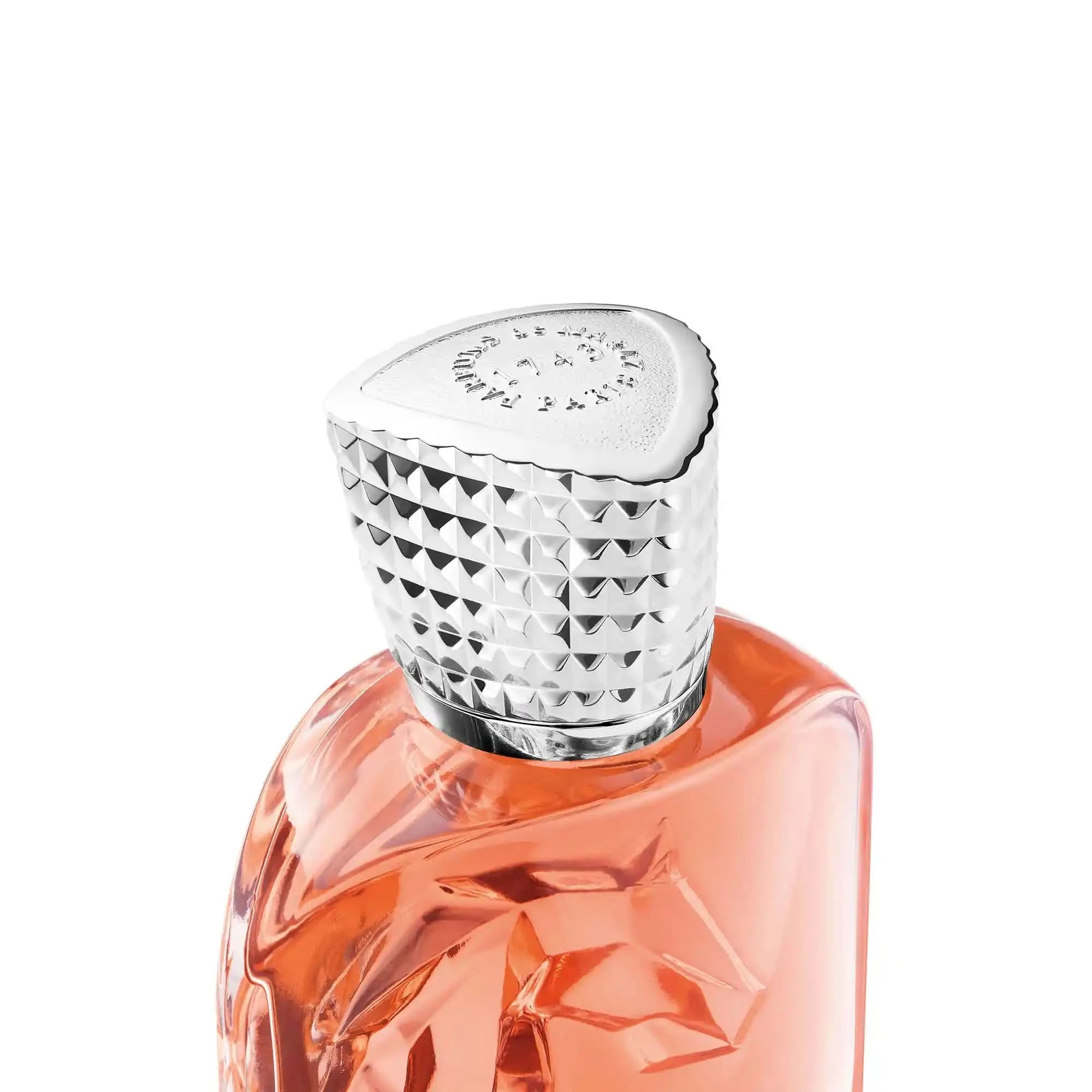 Perfume bottle with a silver cap on a white background