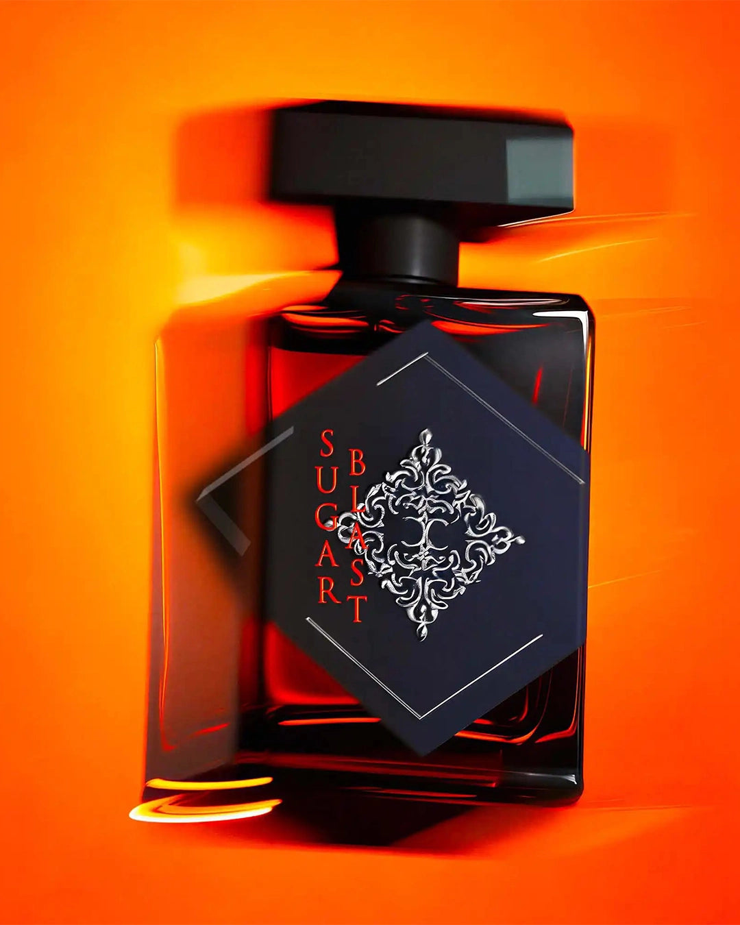 Perfume bottle with decorative label on an orange background