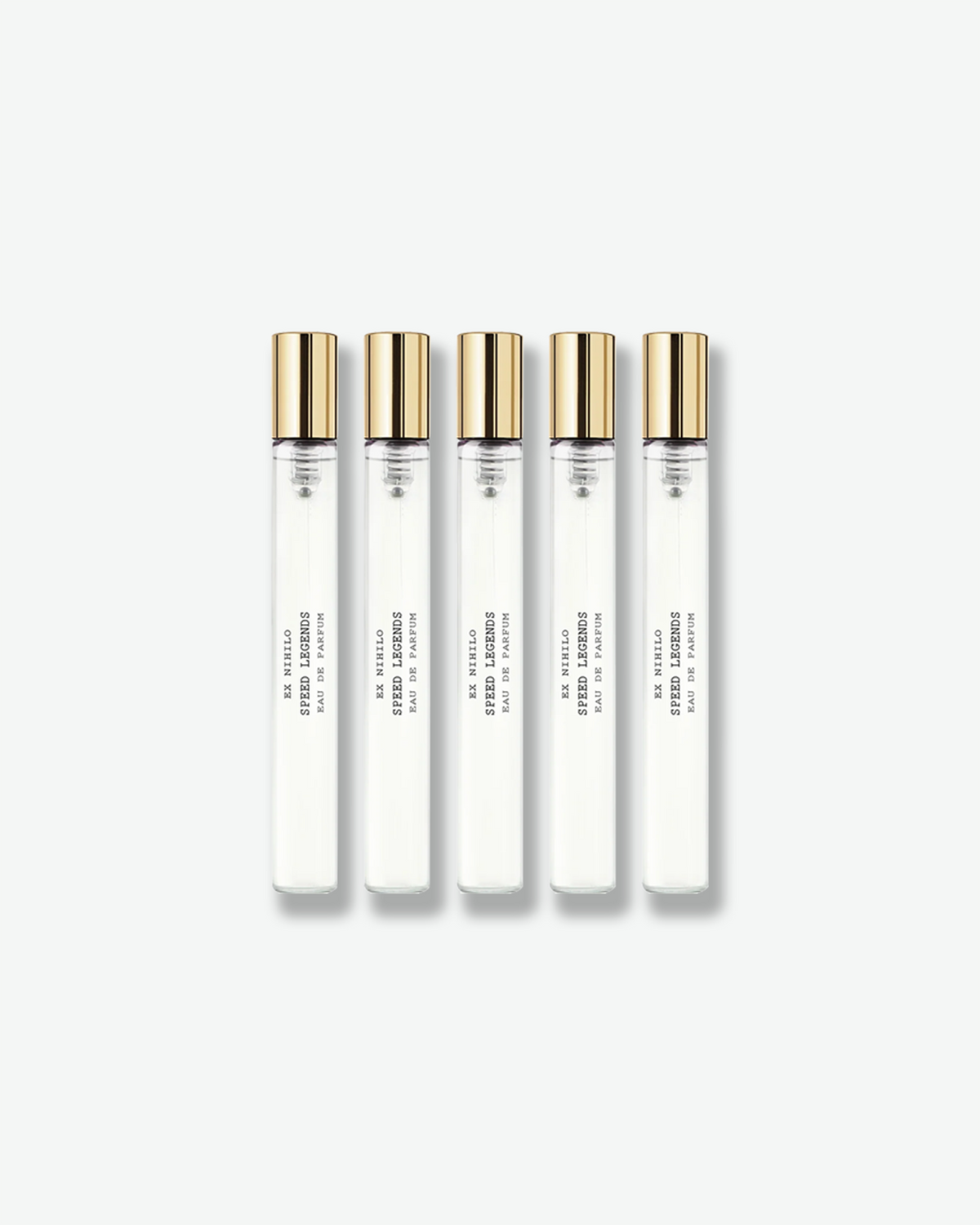 Five clear Ex Nihilo Speed Legends Eau de Parfum travel spray bottles with gold caps, arranged in a row against a white background.