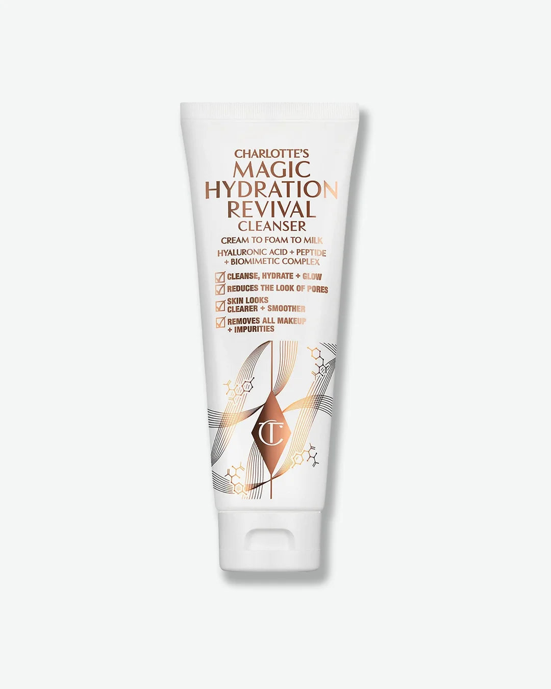 White tube of Charlotte's Magic Hydration Revival Cleanser with rose gold lettering and branding on a white background