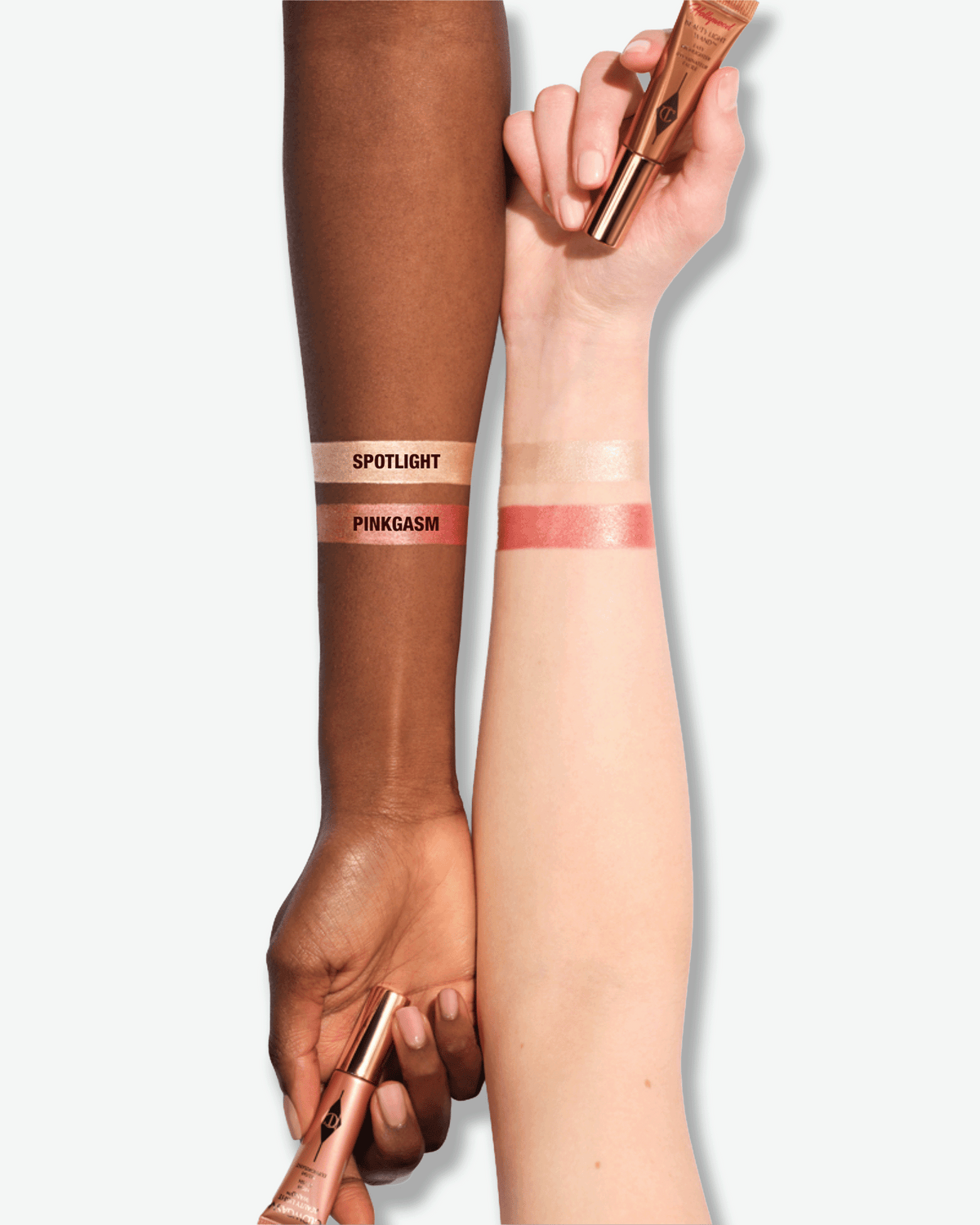 Spotlight and Pinkgasm Beauty Light Wand swatches shown on deep and fair skin tones.