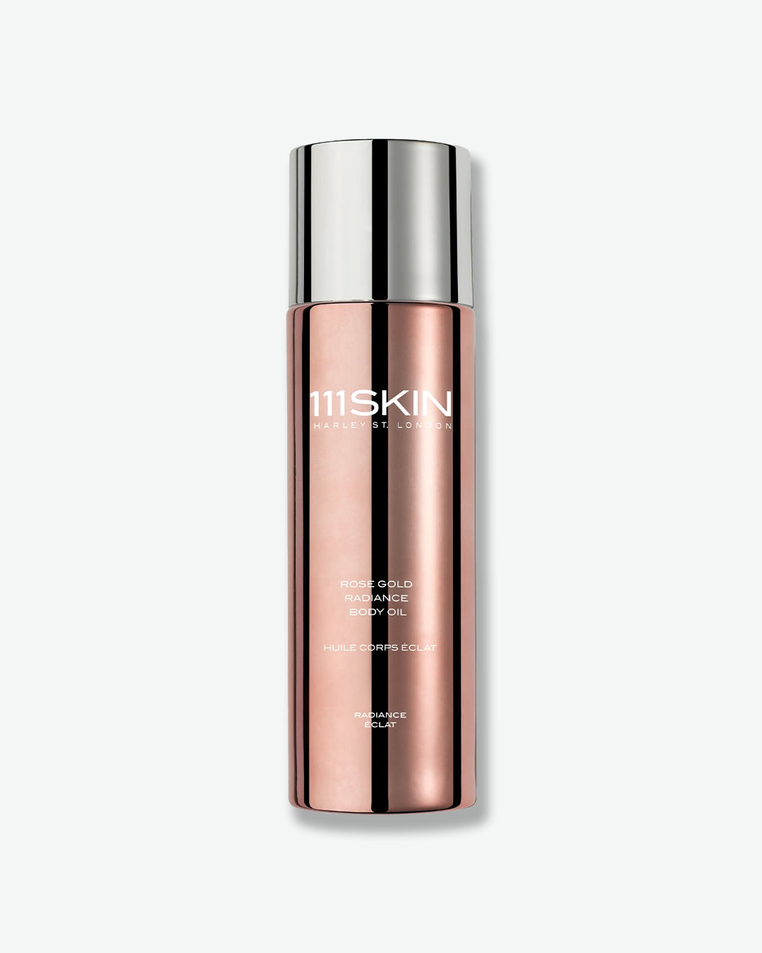 Metallic maroon bottle of 111SKIN rose gold radiance body oil with a silver lid on a white background