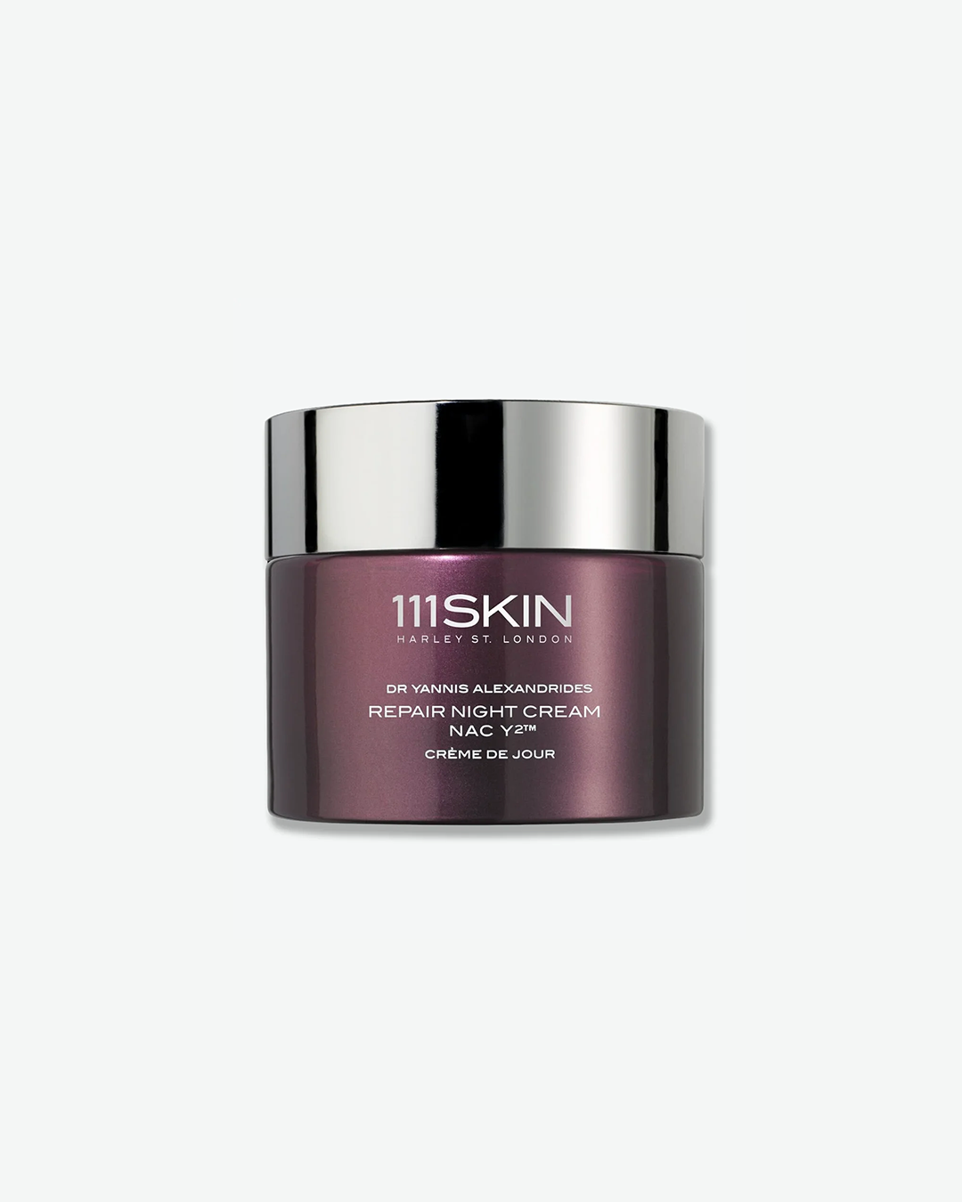 Metallic maroon jar of 111SKIN repair night cream with a silver lid on a white background