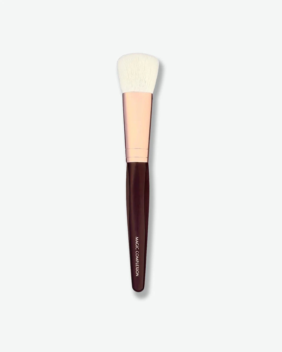 Makeup brush with a brown handle and white bristle head on a light gray background