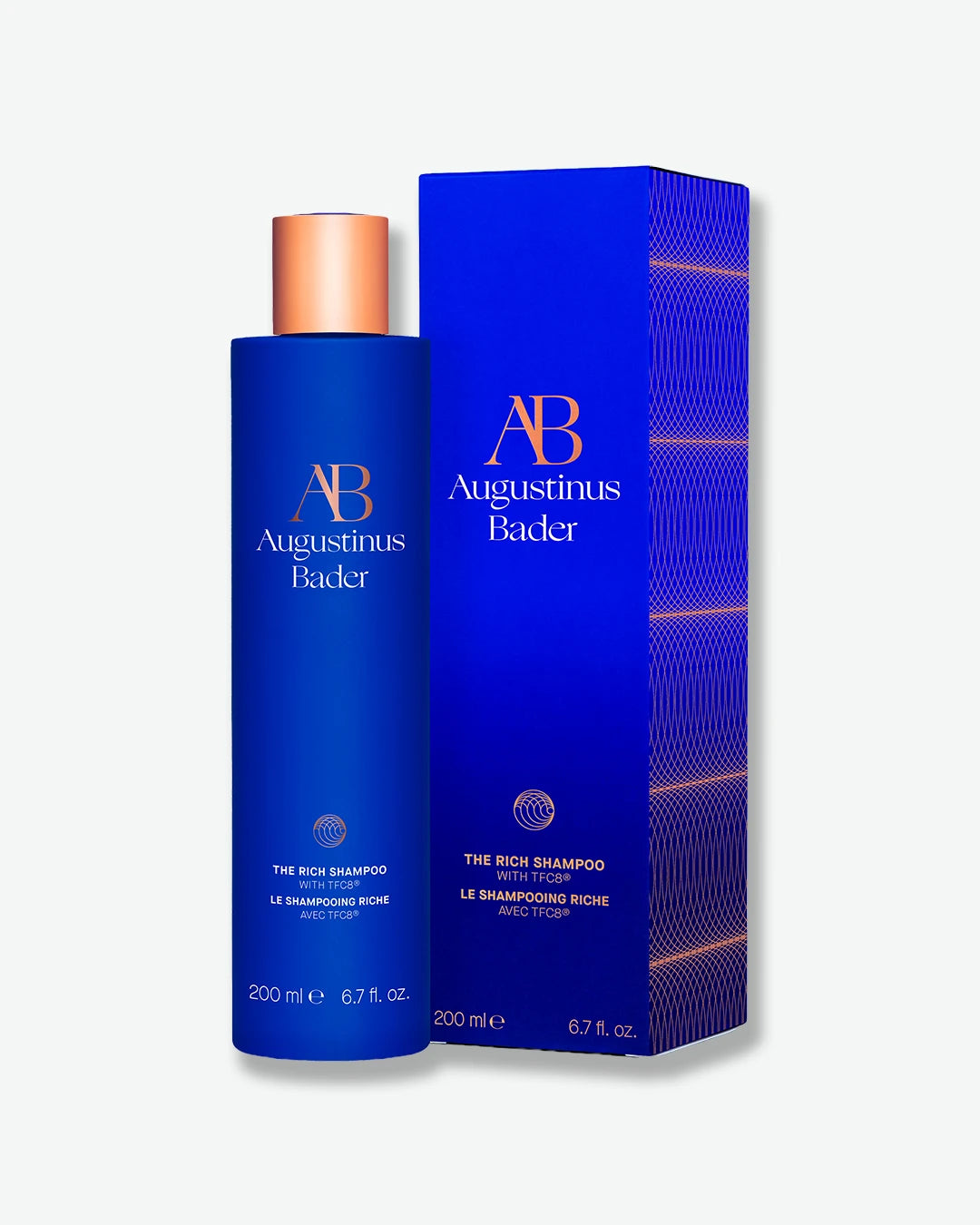 Blue shampoo bottle and packaging with 'AB' branding on a white background.