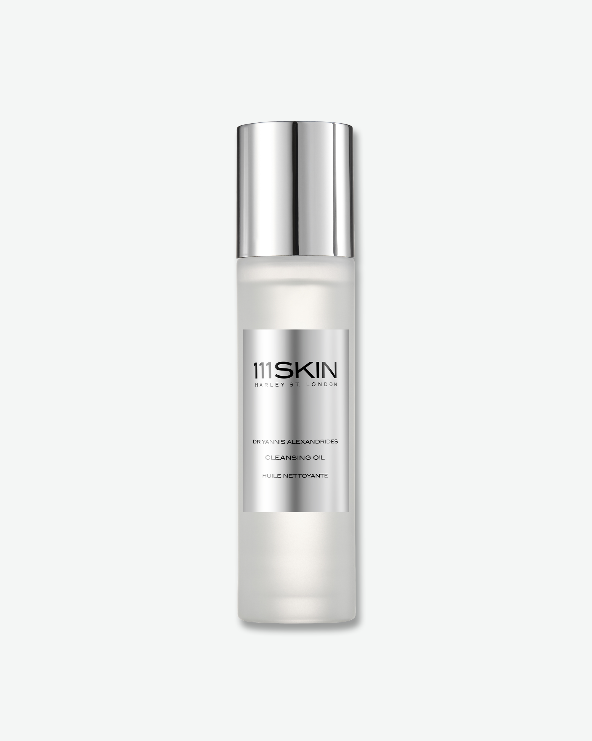 A frosted glass bottle with a metallic silver cap and label for 111SKIN Cleansing Oil.