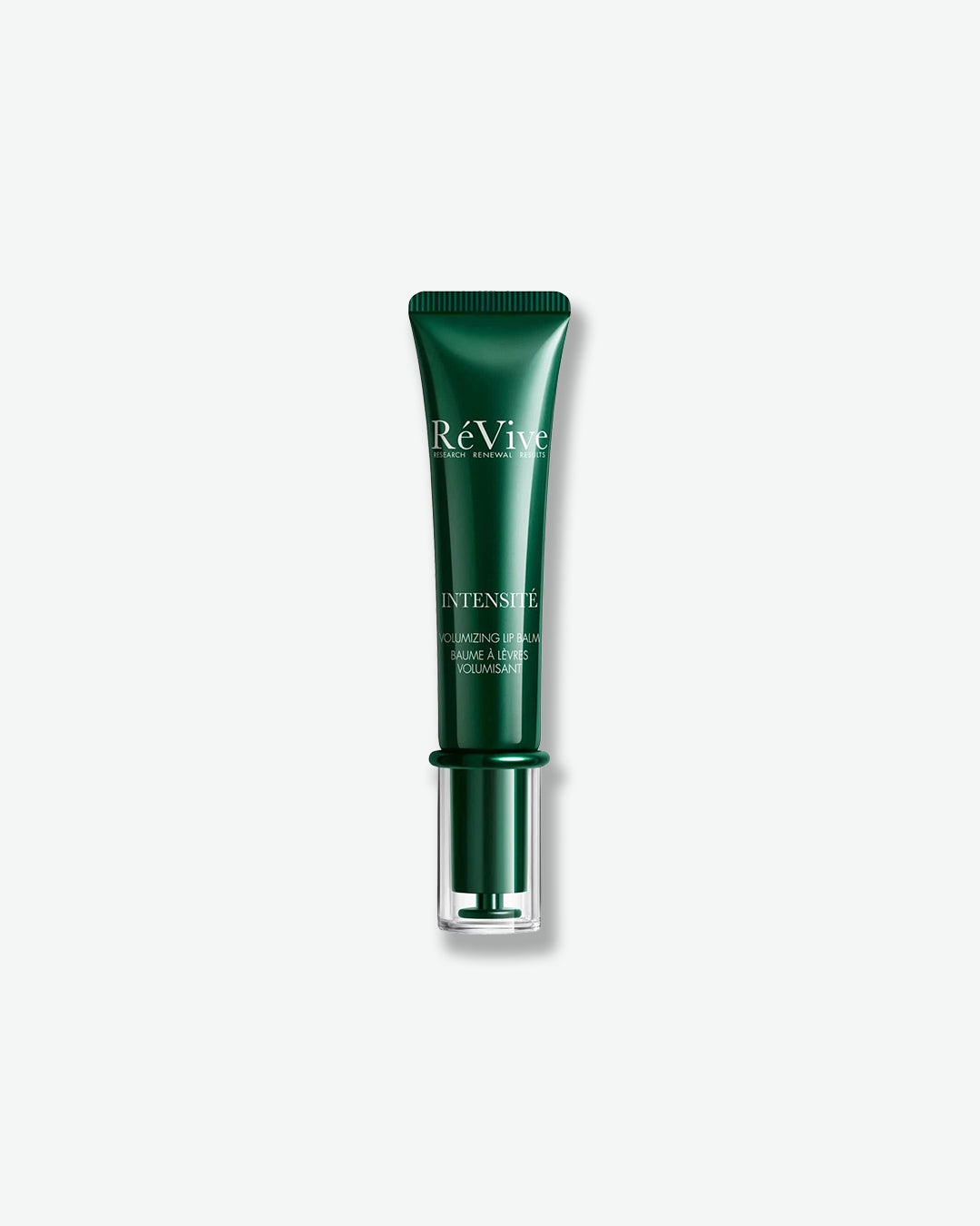 Product image of RéVive Intensité Complete Brow and Lash Serum displayed against a light gray background. The treatment is housed in a sleek deep-green tube with silver branding and a clear base. The image highlights the targeted serum designed to help support the appearance of fuller-looking brows and lashes while conditioning and nourishing hair over time.