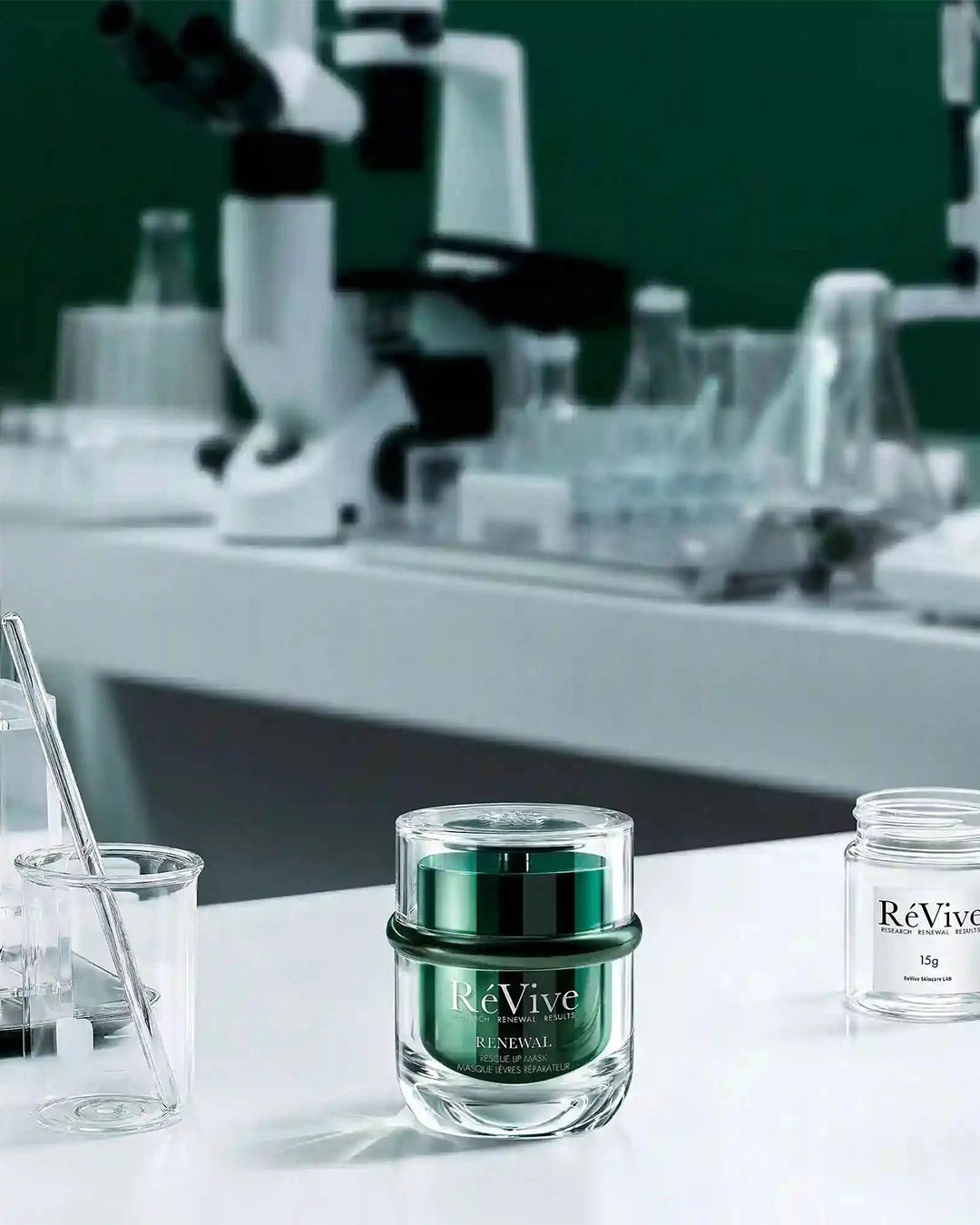 ReVive skincare product with laboratory equipment in the background