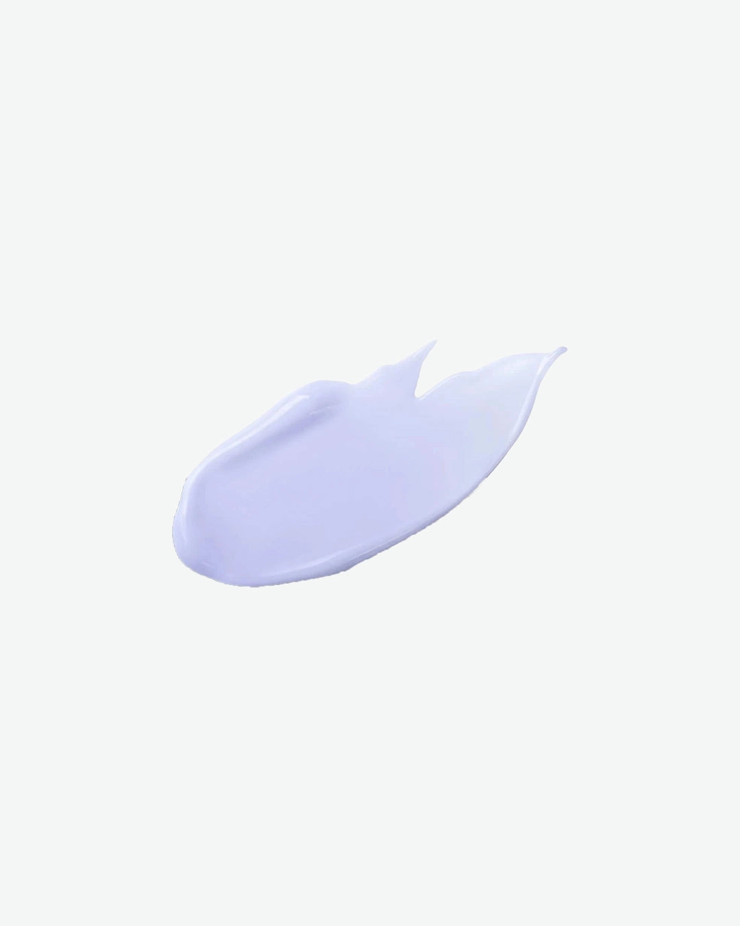 Swatch of light purple cream on a white background