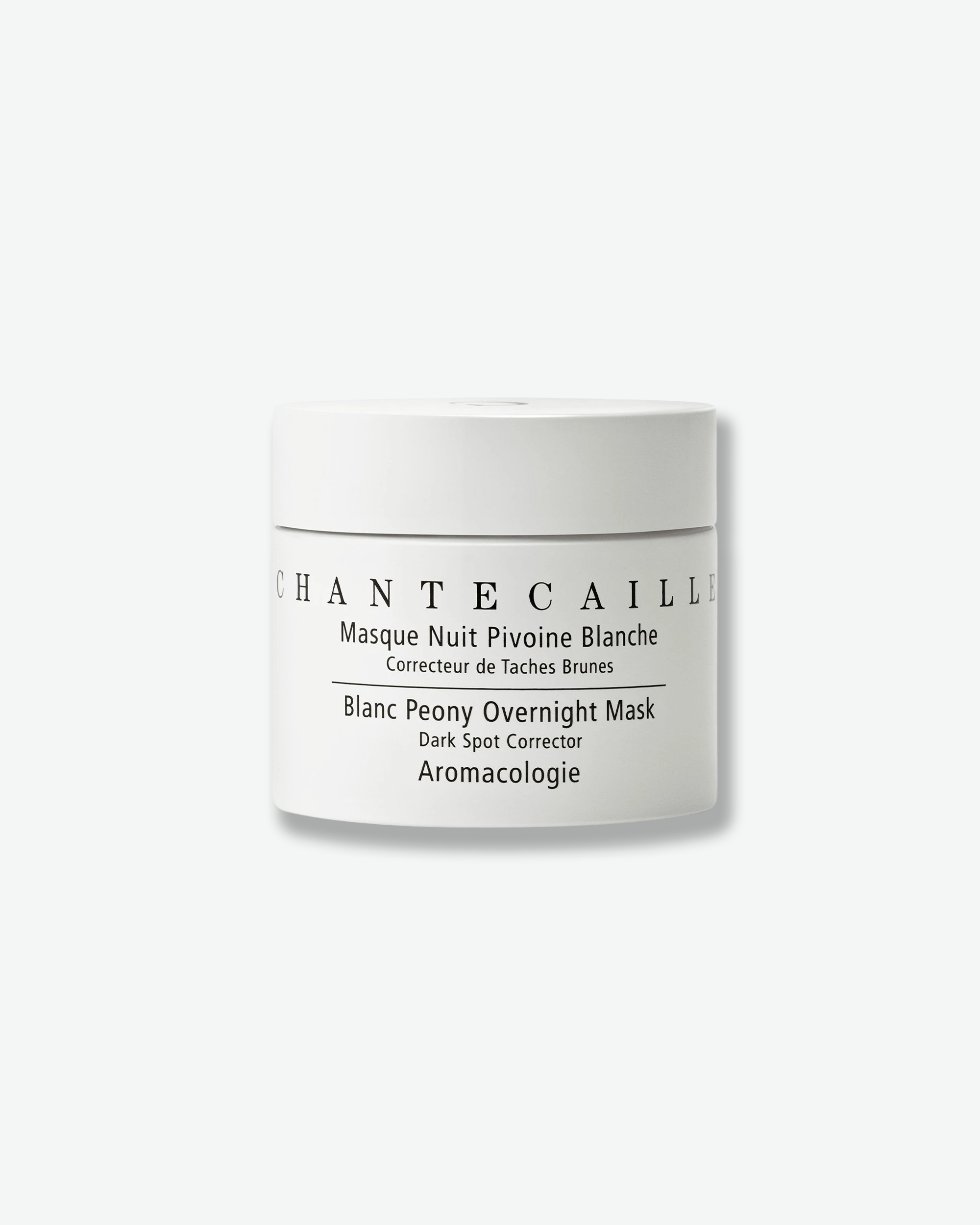 Front view of a Chantecaille Blanc Peony Overnight Mask jar against a plain gray background. The cylindrical cosmetic jar has a clean, matte white finish with the brand name, product title, and "Aromacologie" collection printed in black text.