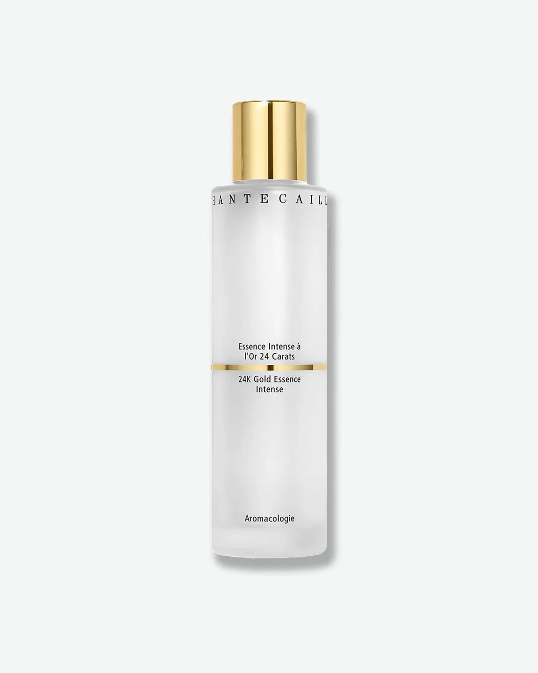 Skincare bottle with gold cap and text on a white background
