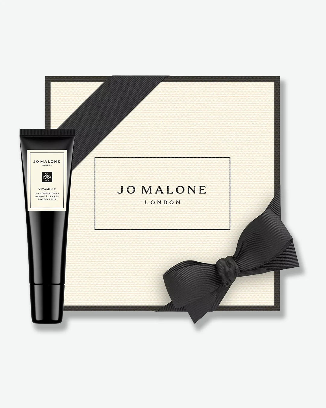Jo Malone London gift set with black tube and bow on a white background