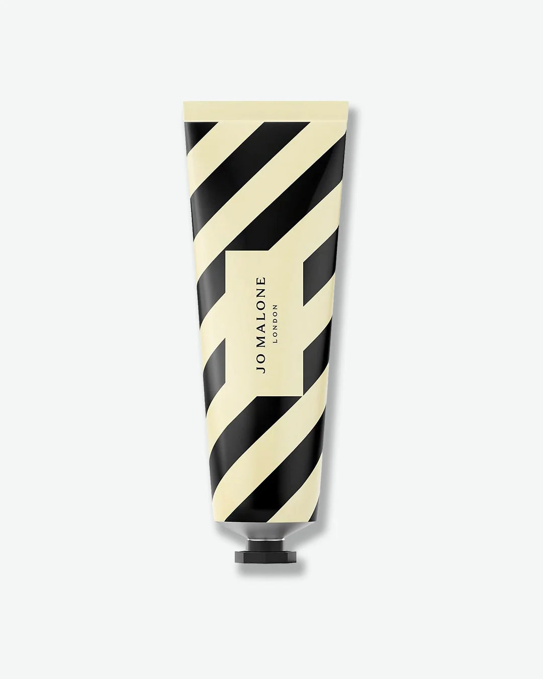Jo Malone hand cream with black and white striped design on a white background