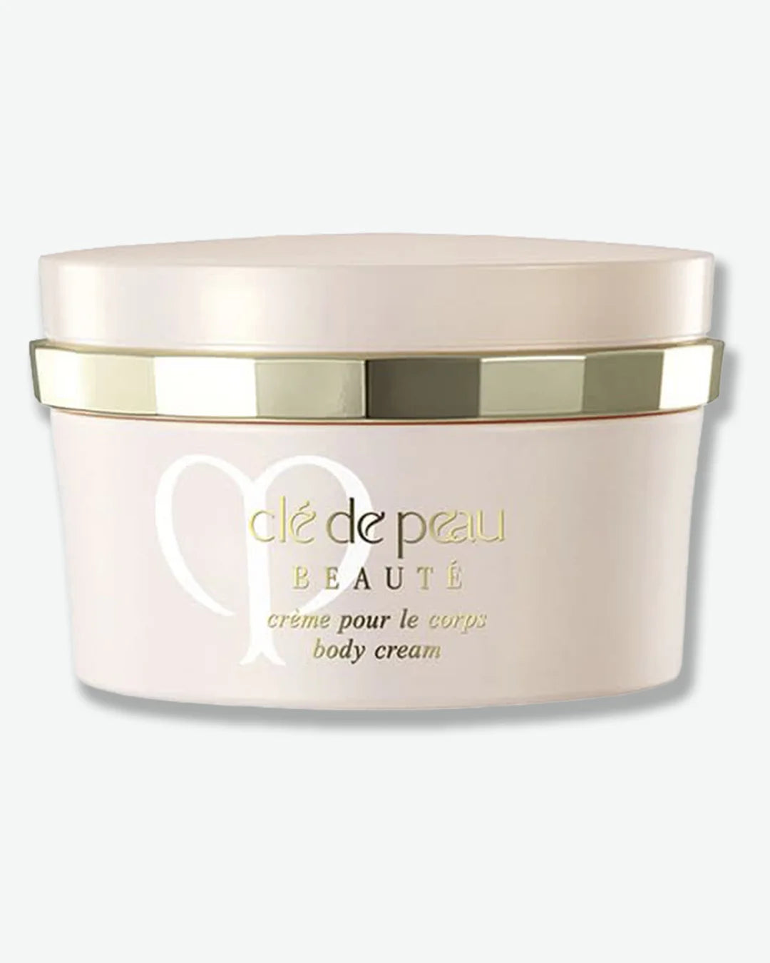 Body cream jar with 'clé de peau Beauté' branding on a white background