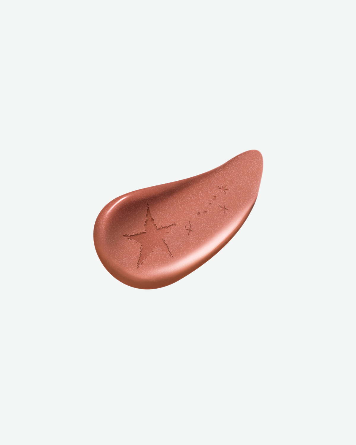 Close-up swatch of Clé de Peau Beauté lipstick in a shimmering rosy nude shade with embossed celestial star details.