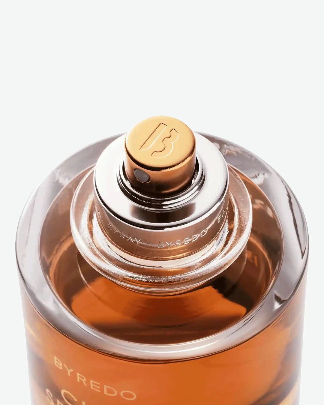 Byredo perfume bottle with a gold cap on a white background