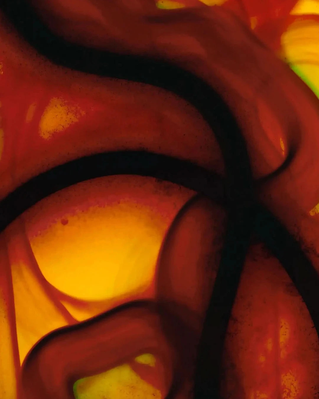 An abstract macro image featuring flowing amber and black tones that resemble liquid moving through a skincare formula. The soft, fluid shapes create a sense of movement and depth, visually representing concentrated active ingredients, advanced skincare technology, or a high-performance formulation. The image is artistic and non-representational, with a warm, luminous appearance.