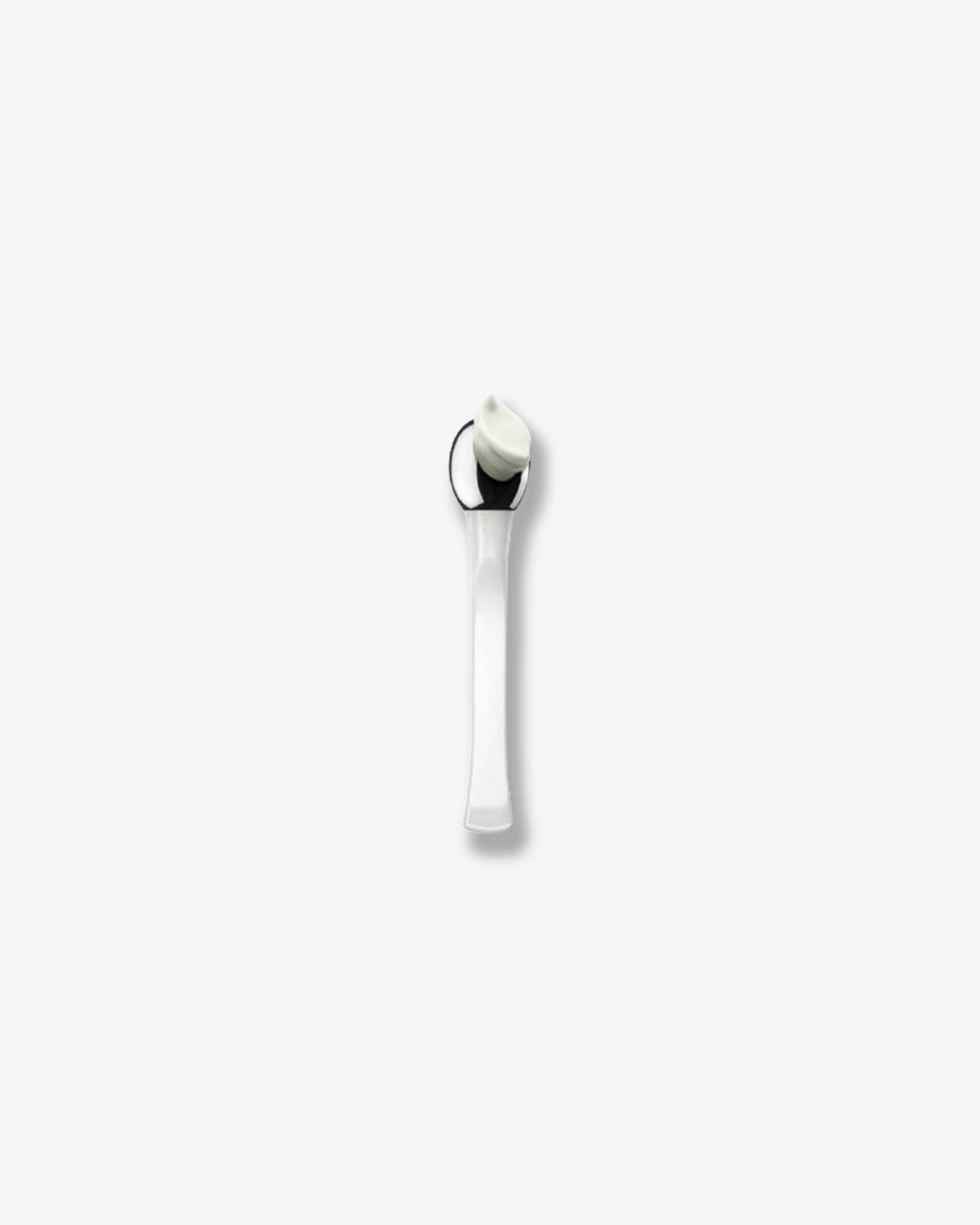 Silver spoon on a white background