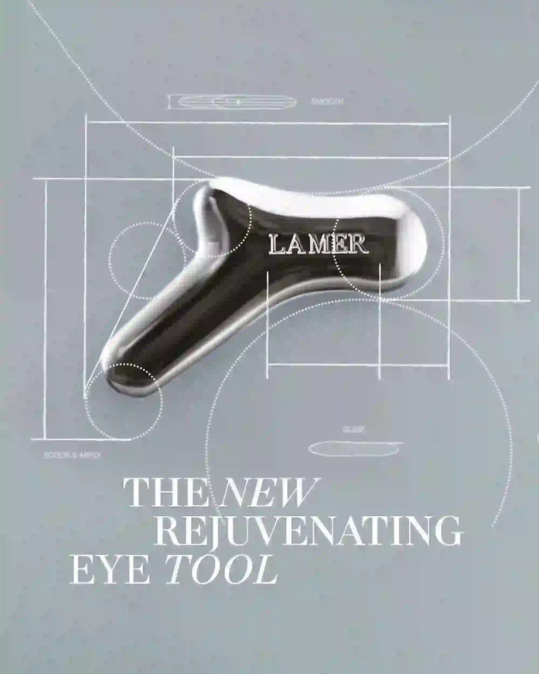 LA MER eye tool on a gray background with text about a rejuvenating eye tool.