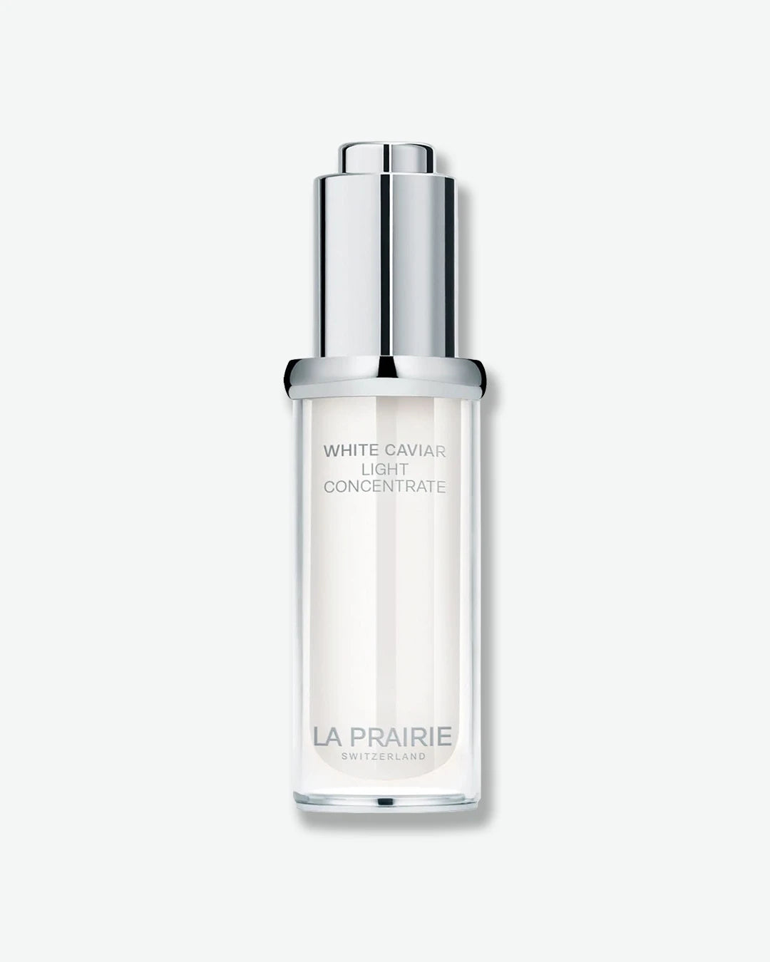 A sleek white serum bottle with a silver pump dispenser and metallic silver cap. The bottle is labeled “White Caviar Light Concentrate” by La Prairie and features a minimalist, luxury design. Displayed against a light gray background.