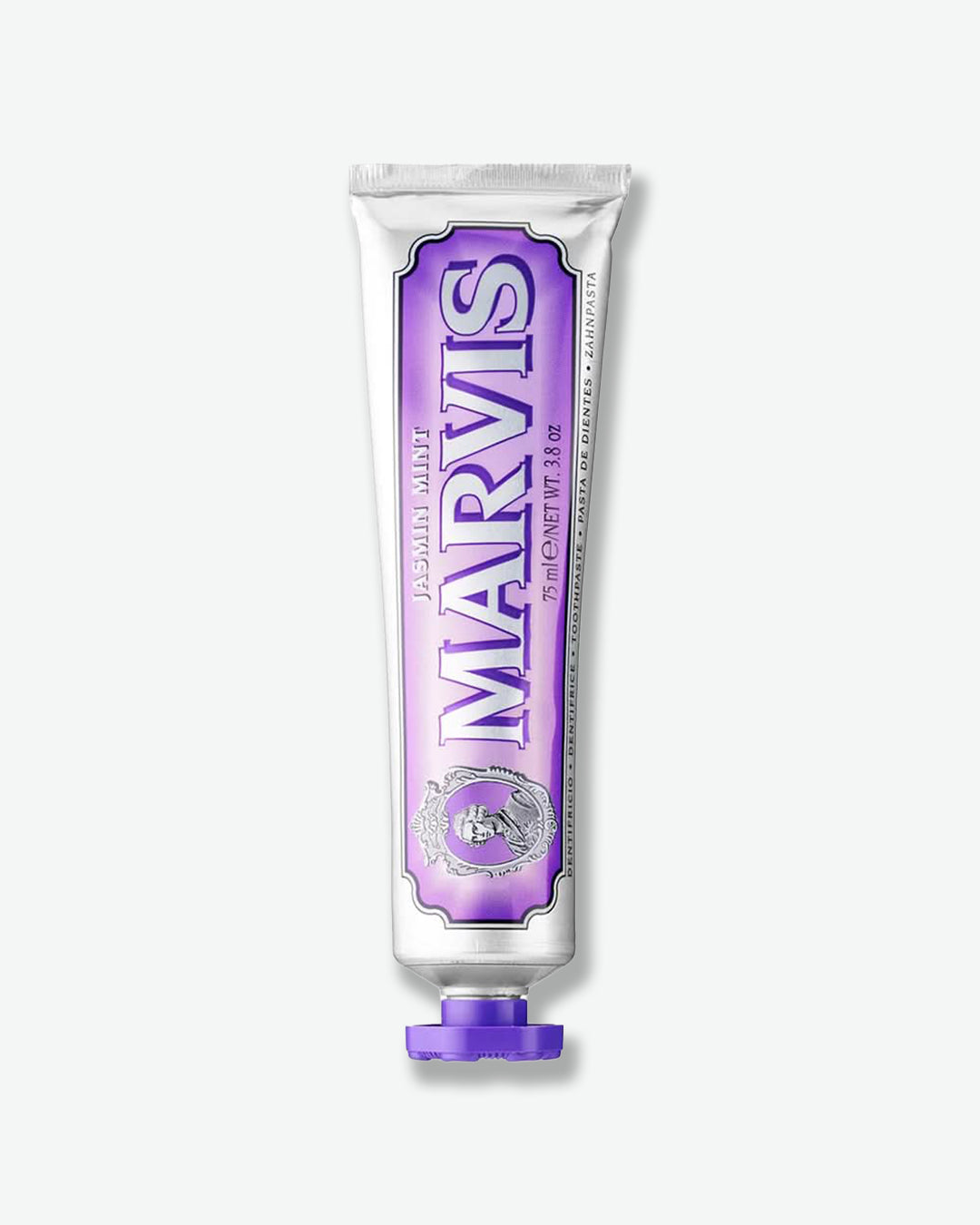 Marvis toothpaste tube with purple and white design on a white background