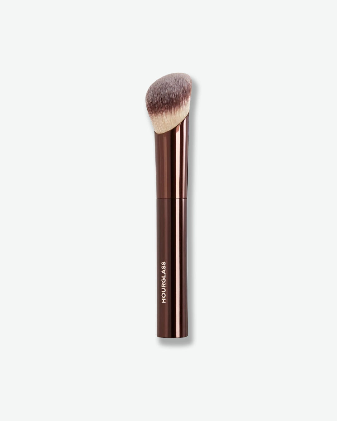 Hourglass makeup brush on a white background