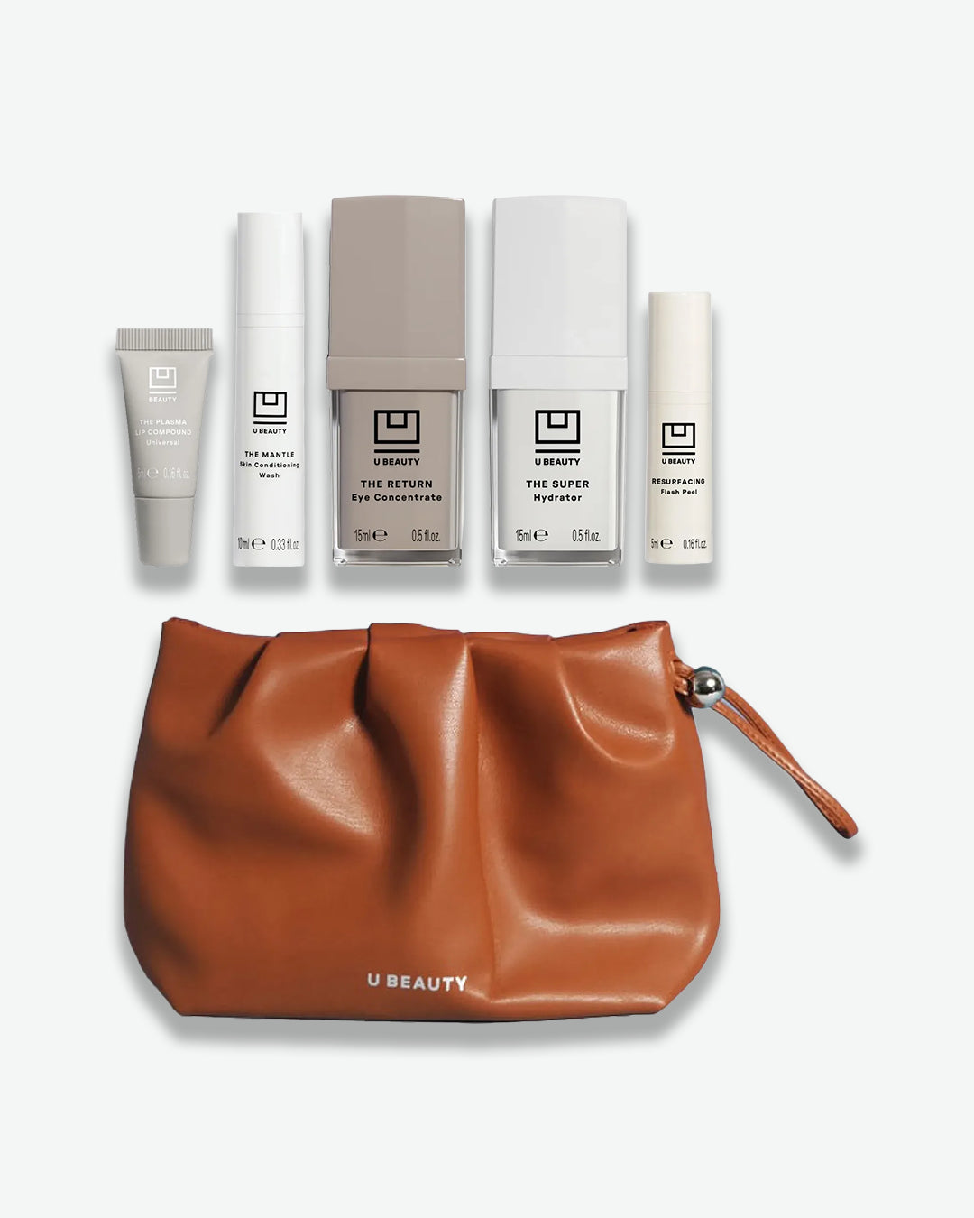 Set of skincare products with a brown pouch on a white background