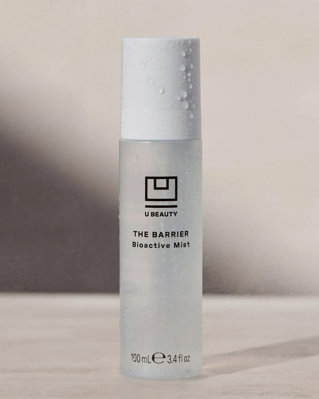 U Beauty The Barrier Bioactive Mist bottle on a neutral background