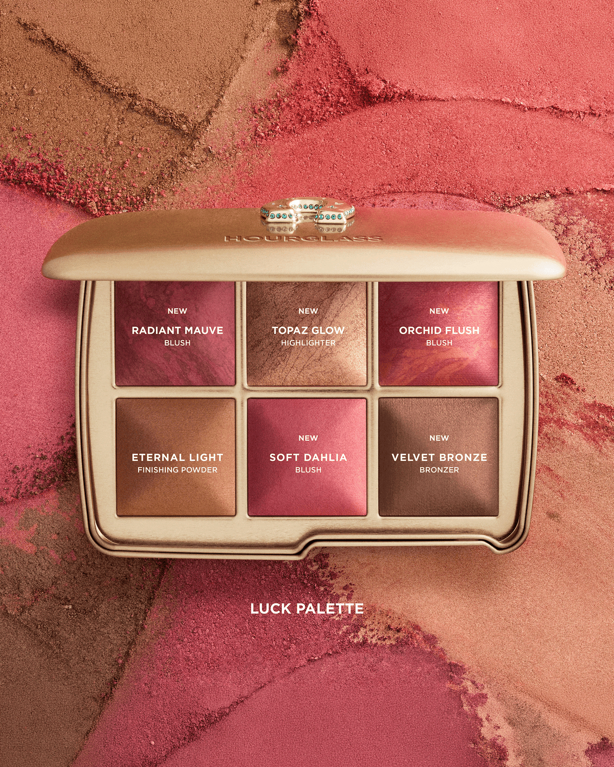 Open Hourglass Luck Palette surrounded by coordinating powder textures, highlighting Radiant Mauve, Topaz Glow, Orchid Flush, Eternal Light, Soft Dahlia, and Velvet Bronze.