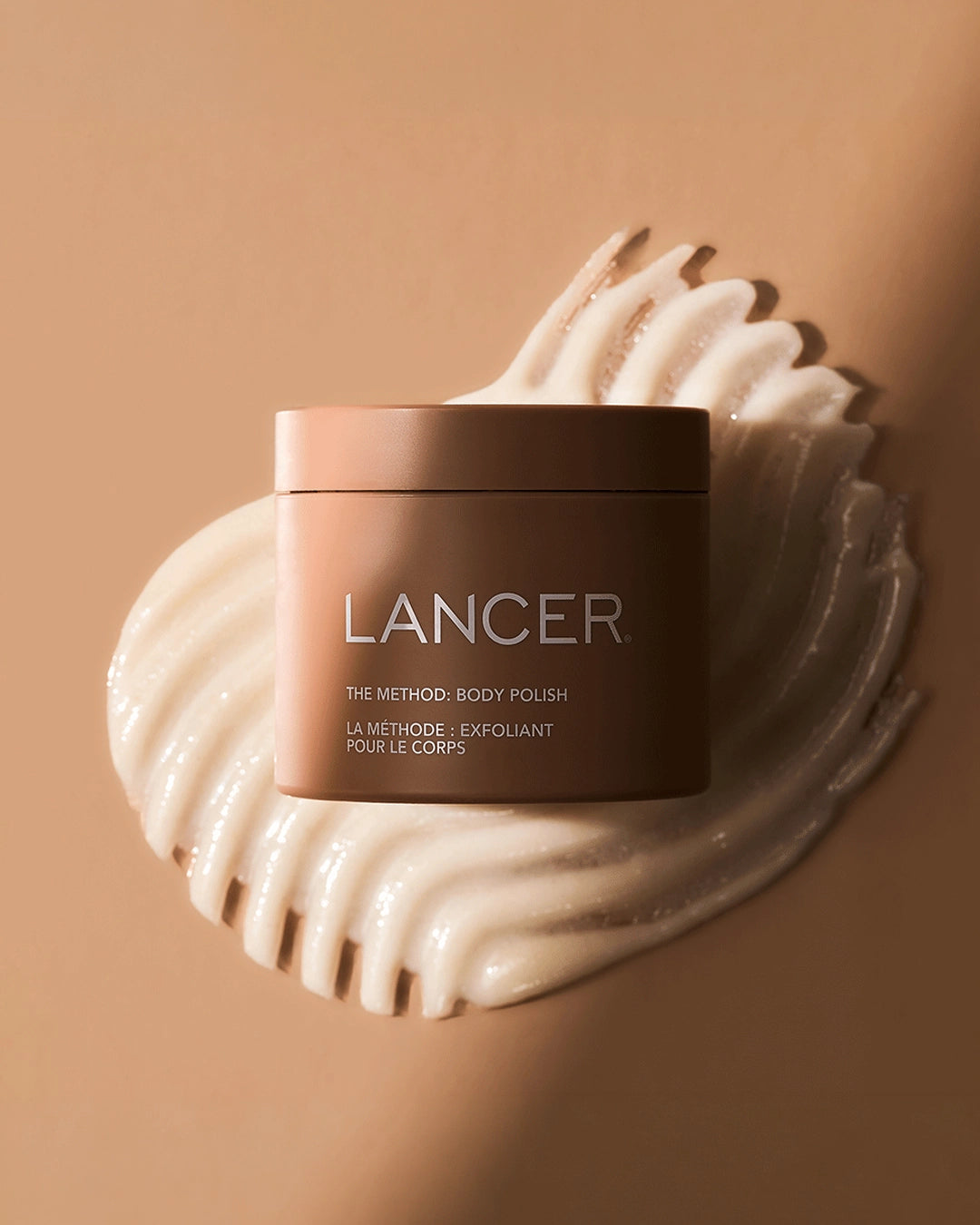Lancer body polish jar with cream on a beige background