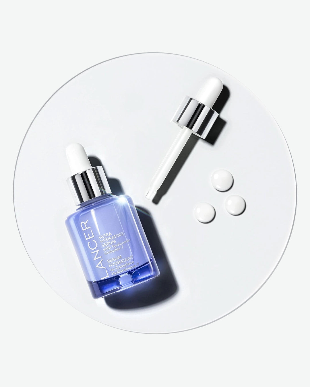 Lancer serum bottle with dropper on a white background