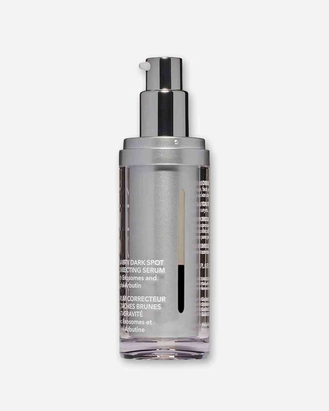 A product shot displaying the back view of a Lancer Gravity Dark Spot Correcting Serum bottle with its cap removed, centered against a plain light gray background. The inner container has a metallic silver core visible through a clear, thick-walled plastic outer cylinder. It is fitted with a polished chrome silver pump mechanism and features a slender, vertical window strip on the side revealing the product level inside.