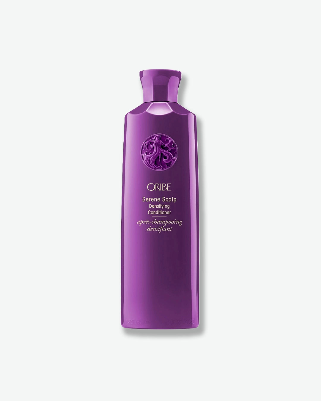 Purple Oribe bottle on a white background