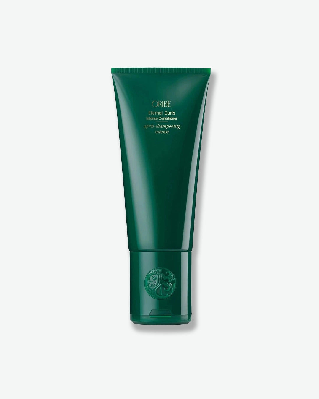 Green tube of hair product on a white background