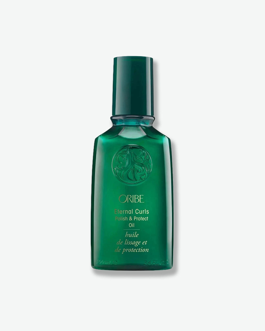 Green bottle of Oribe Eternal Curls Smooth & Protect Oil on a white background